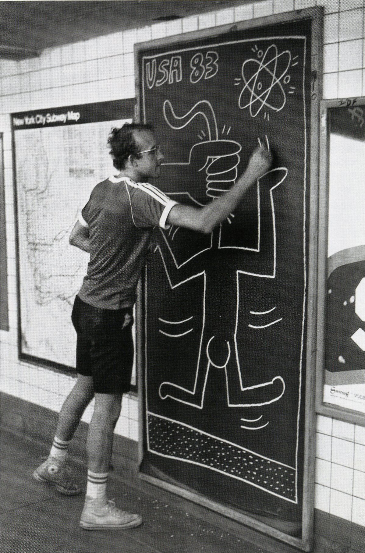 Haring drawing in the New York City subway system. (photo courtesy of the Keith Haring Foundation)